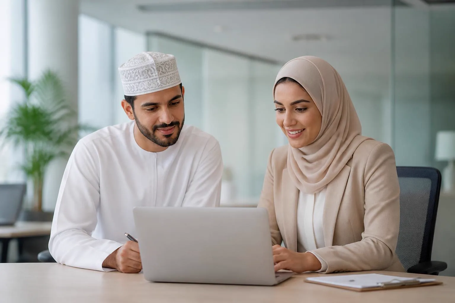 A Gulf business team reviewing ongoing Google Workspace administration on a laptop