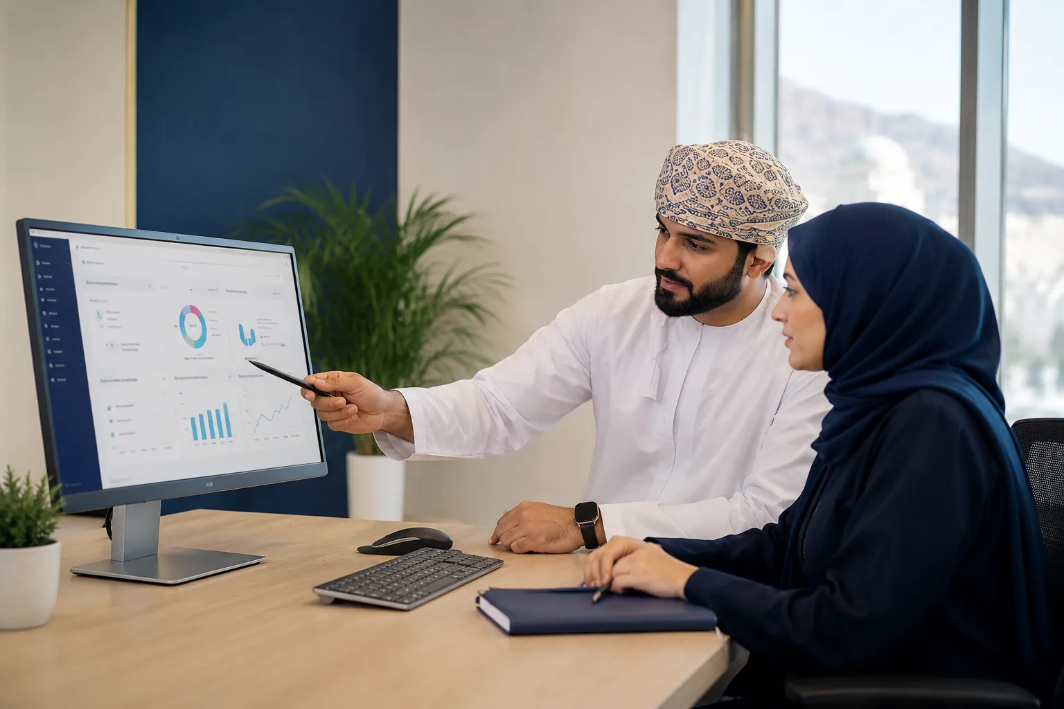 Omani professionals reviewing a Microsoft 365 administration dashboard